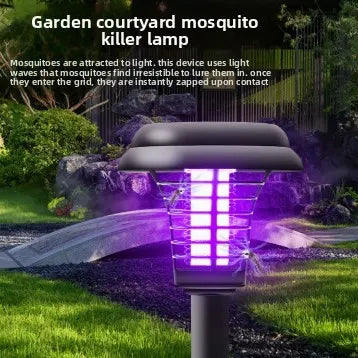 StarOLED 2-in-1 solar mosquito zapper and garden stake light glowing at dusk